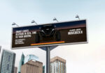 Billboard advertising the Can-Am Maverick R .